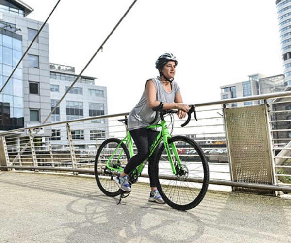 Woman Cycling to Work 5 Great Reasons To Start Cycling